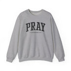 Front view of Sport Grey crewneck sweatshirt with black large PRAY text and Colossians 4:2 below it across chest