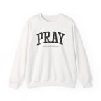 Front view of White crewneck sweatshirt with black large PRAY text and Colossians 4:2 below it across chest
