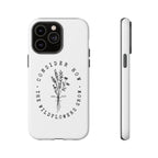 White iPhone case with black floral graphic and Luke 12:27 Bible verse displayed on an iPhone 14 Pro Max