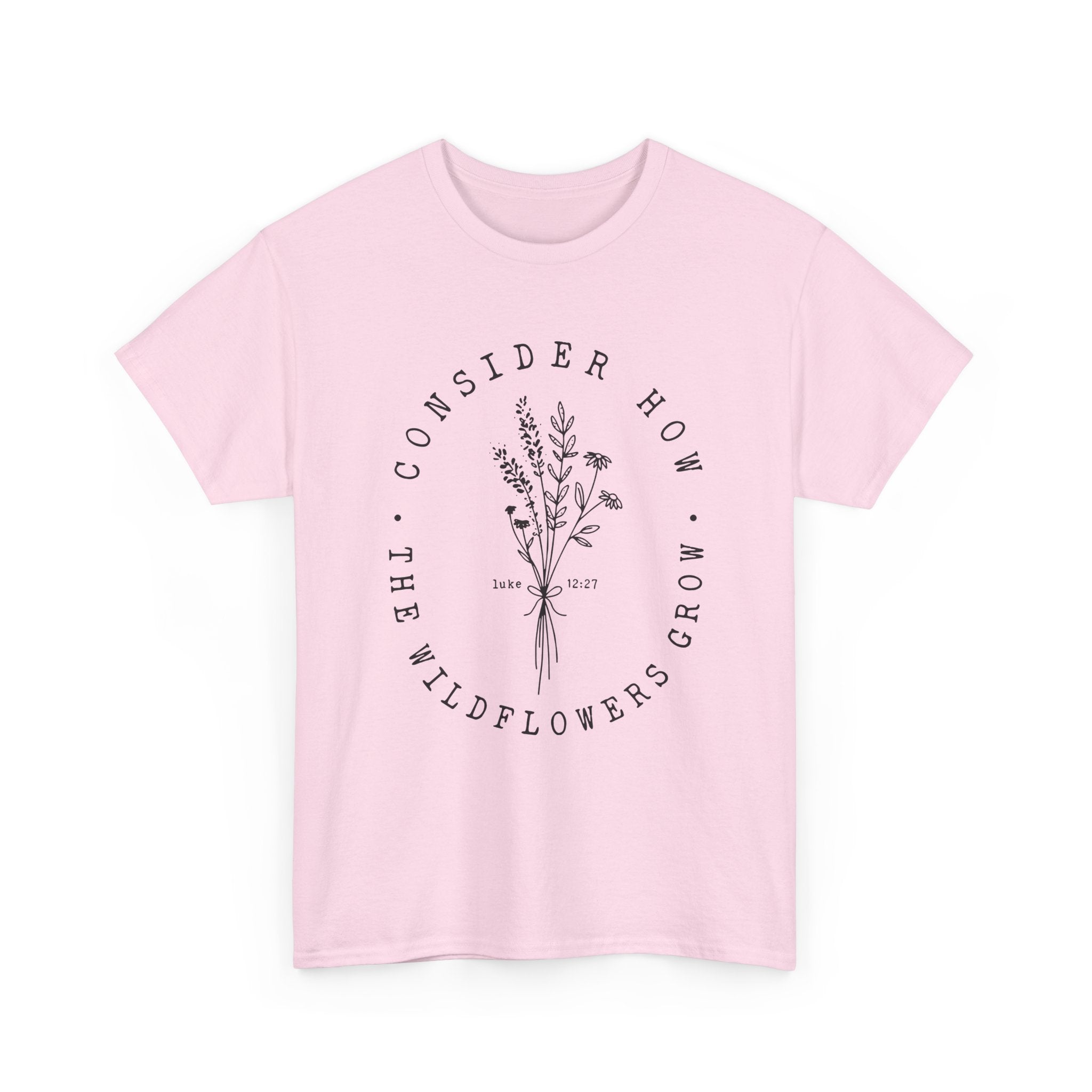 Front view Light Pink t-shirt with large black floral graphic and Luke 12:27 Bible verse 