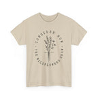 Front view Sand t-shirt with large black floral graphic and Luke 12:27 Bible verse 