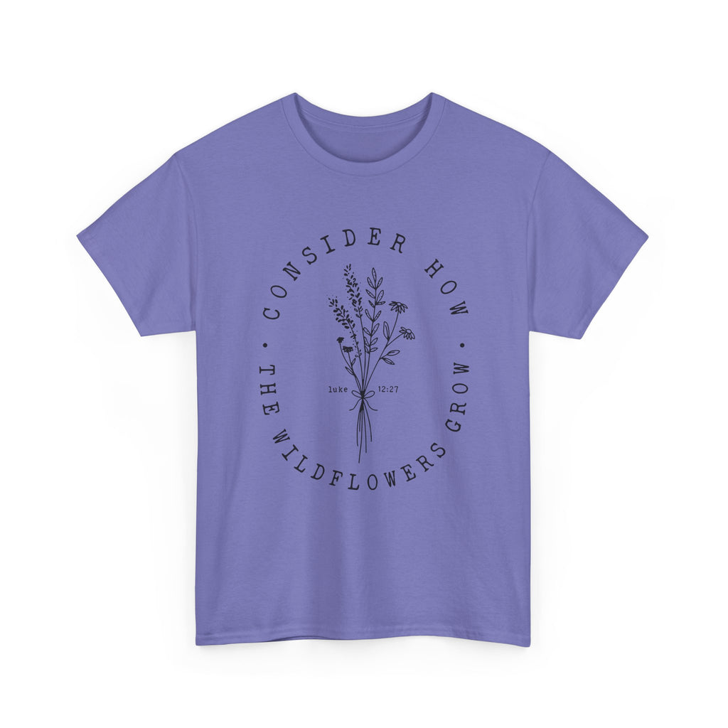 Front view Violet t-shirt with large black floral graphic and Luke 12:27 Bible verse 