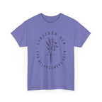 Front view Violet t-shirt with large black floral graphic and Luke 12:27 Bible verse 