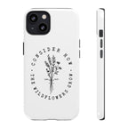 White iPhone case with black floral graphic and Luke 12:27 Bible verse displayed on an iPhone 13