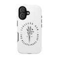 White iPhone case with black floral graphic and Luke 12:27 Bible verse displayed on an iPhone 17