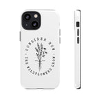 White iPhone case with black floral graphic and Luke 12:27 Bible verse displayed on an iPhone 13 Mini