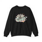 Front view Black crewneck sweatshirt colorful graphic and text saying ‘Be the Light’ 