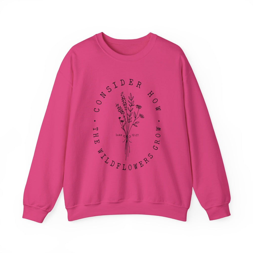 Front view Heliconia crewneck sweatshirt black floral graphic and 'Consider How the Wildflowers Grow' text from Bible verse Luke 12:27