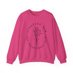 Front view Heliconia crewneck sweatshirt black floral graphic and 'Consider How the Wildflowers Grow' text from Bible verse Luke 12:27