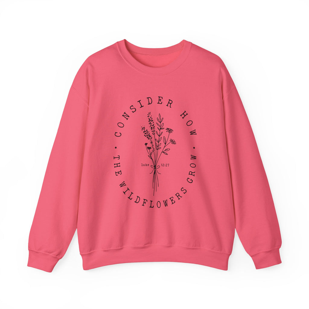 Front view Safety Pink crewneck sweatshirt black floral graphic and 'Consider How the Wildflowers Grow' text from Bible verse Luke 12:27