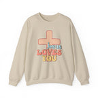 Front view Sand crewneck sweatshirt colorful graphic and text saying ‘Jesus Loves You’