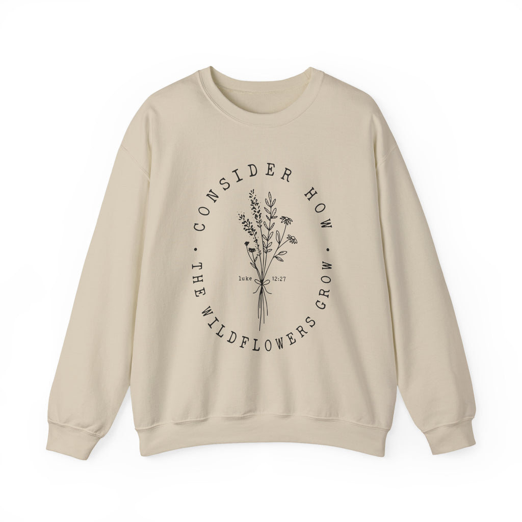 Front view Sand crewneck sweatshirt black floral graphic and 'Consider How the Wildflowers Grow' text from Bible verse Luke 12:27