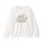 Front view White crewneck sweatshirt colorful graphic and text saying ‘Be the Light’ 