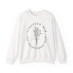 Front view White crewneck sweatshirt black floral graphic and 'Consider How the Wildflowers Grow' text from Bible verse Luke 12:27