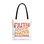 Front view of large White tote bag with black handles and colorful graphic that says Faith Can Move Mountains