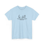 Front view of Light Blue t-shirt with black text Be Still And Know That I Am God Psalm 46:10 centered on chest