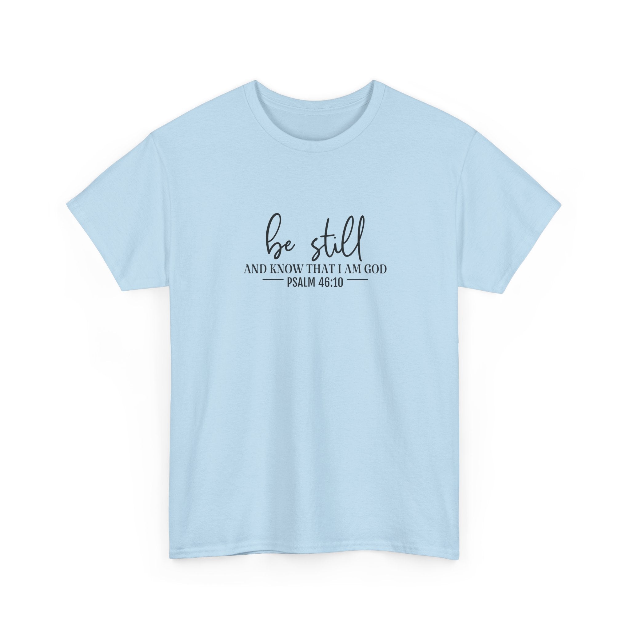 Front view of Light Blue t-shirt with black text Be Still And Know That I Am God Psalm 46:10 centered on chest