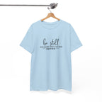 Front view of Light Blue t-shirt with black text Be Still And Know That I Am God Psalm 46:10 centered on chest. Shirt is displayed on a hanger.