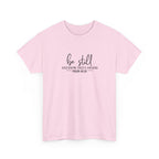 Front view of Light Pink t-shirt with black text Be Still And Know That I Am God Psalm 46:10 centered on chest