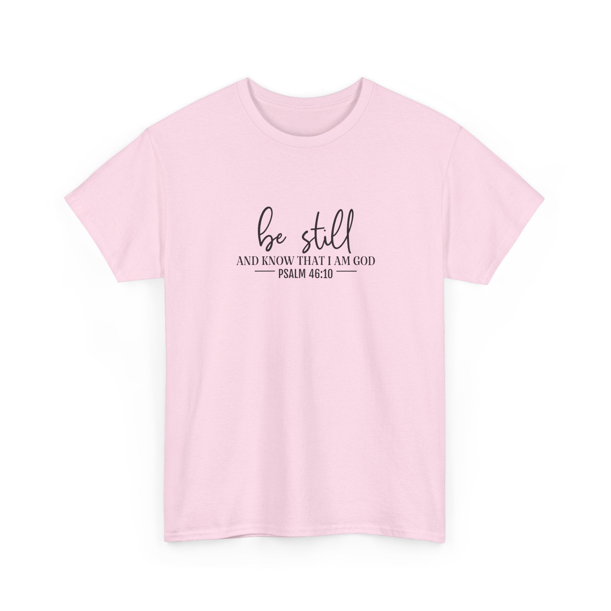 Front view of Light Pink t-shirt with black text Be Still And Know That I Am God Psalm 46:10 centered on chest