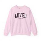 Front view of Light Pink crewneck sweatshirt with black large LOVED text and John 3:16 below it across chest