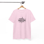 Front view of Light Pink t-shirt with black text Make Heaven Crowded centered on chest. Displayed on a hanger.