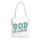 Front view of medium White tote bag with white handles and colorful graphic that says God is Good