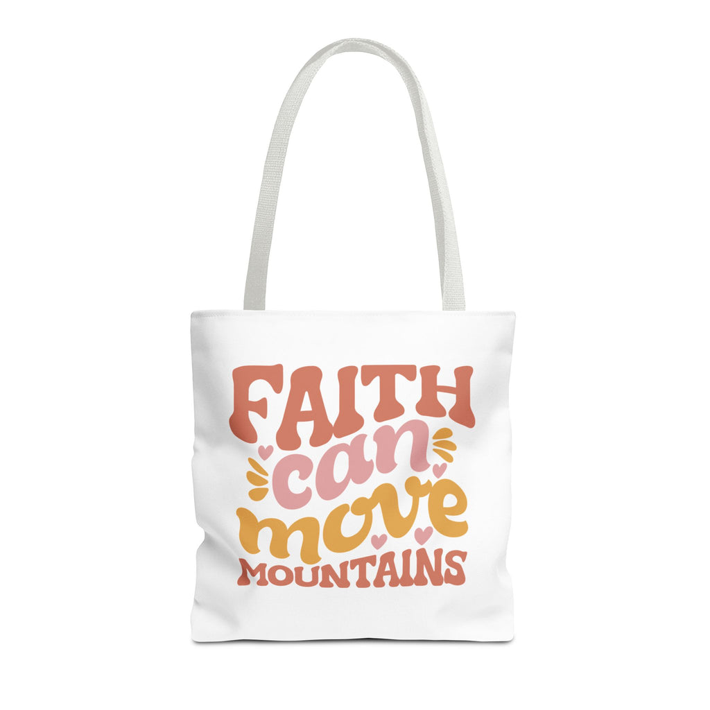 Front view of medium White tote bag with white handles and colorful graphic that says Faith Can Move Mountains