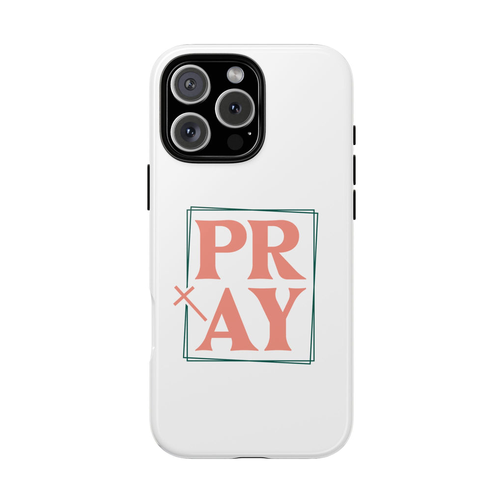 White iPhone case with pink text graphic that says PRAY displayed on an iPhone 16 Pro Max