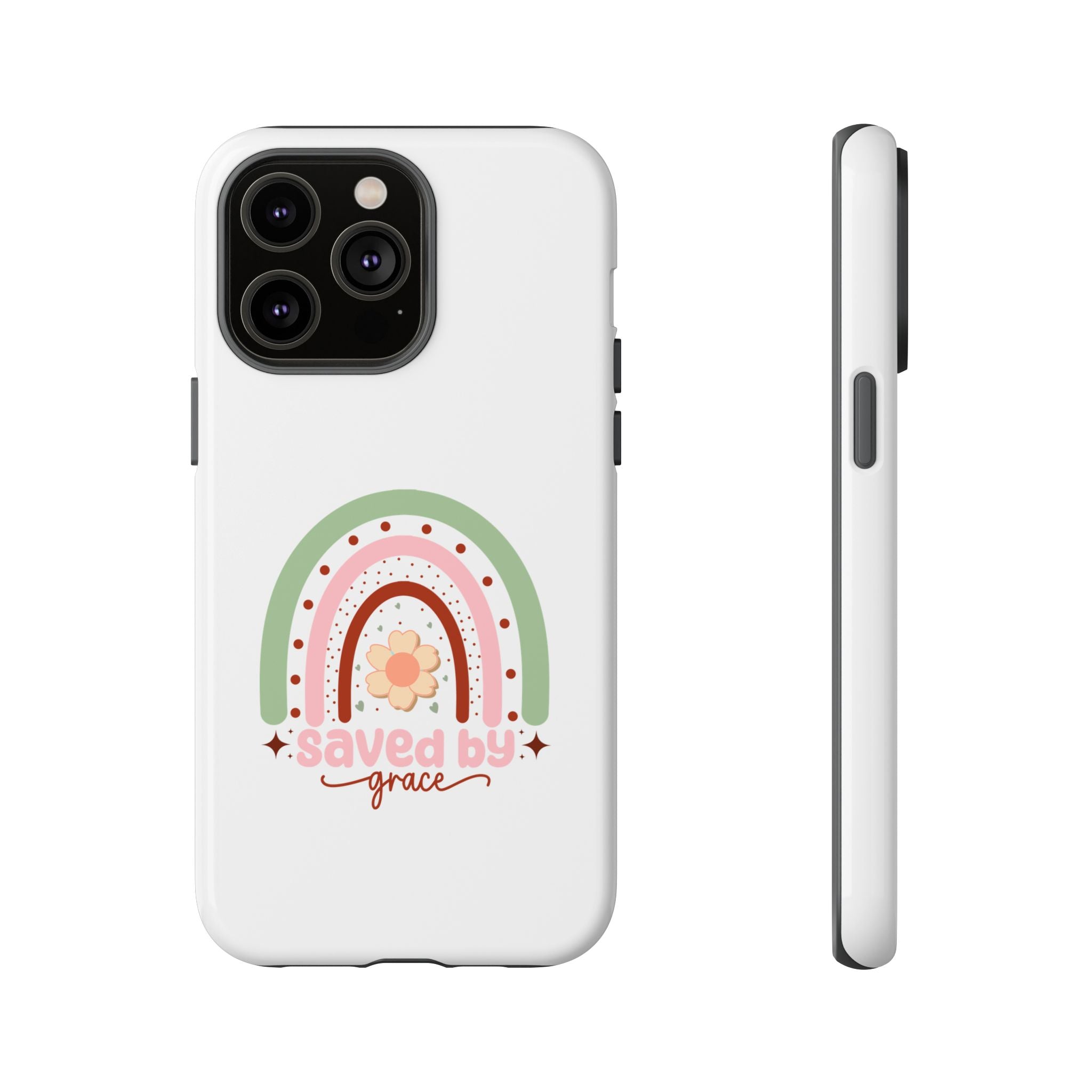 White iPhone case with rainbow graphic saying Saved by Grace displayed on an iPhone 14 Pro Max
