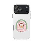 White iPhone case with rainbow graphic saying Saved by Grace displayed on an iPhone 17 Pro Max