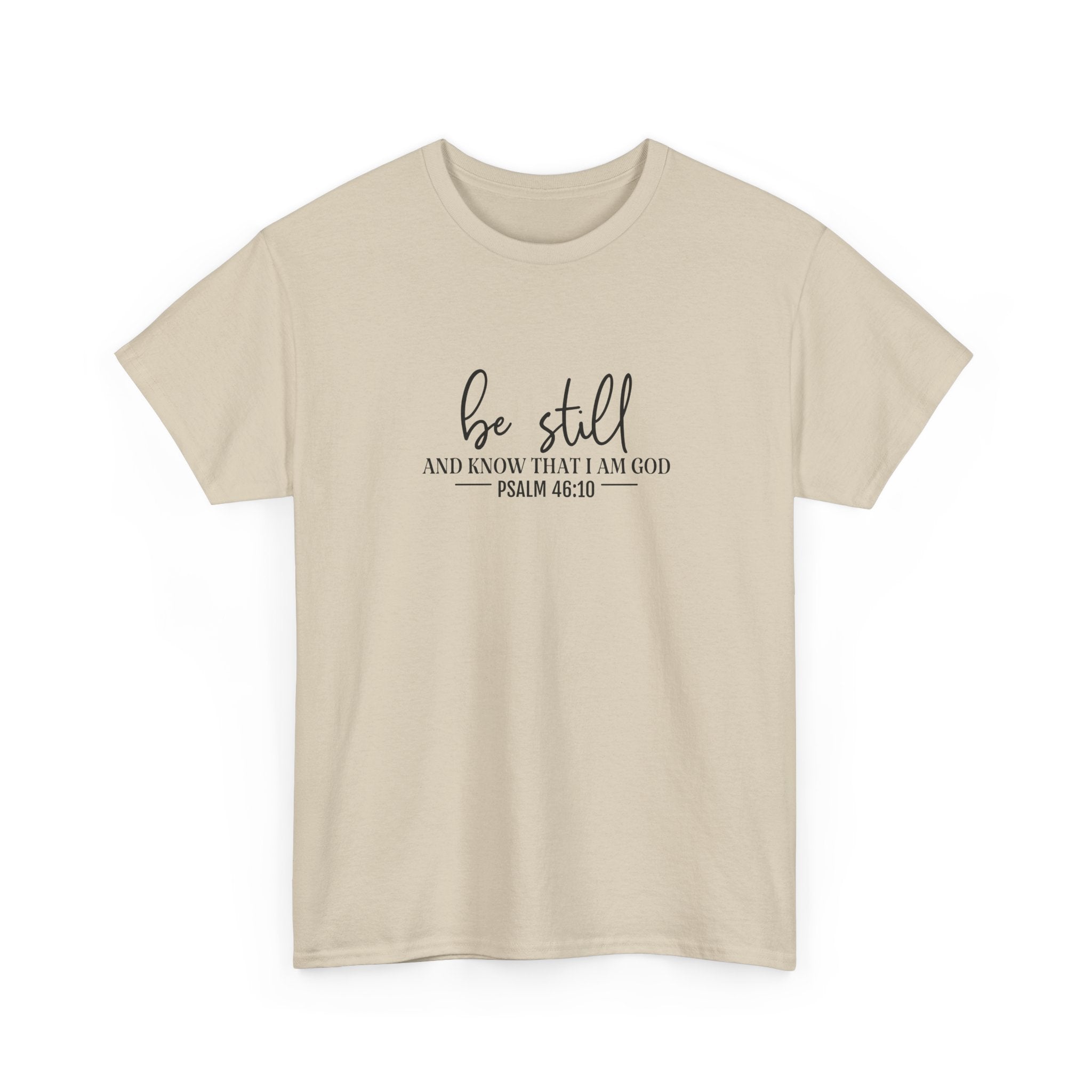 Front view of Sand t-shirt with black text Be Still And Know That I Am God Psalm 46:10 centered on chest