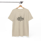 Front view of Sand t-shirt with black text Make Heaven Crowded centered on chest. Displayed on a hanger.