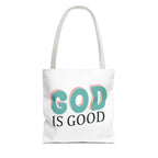 Front view of small White tote bag with white handles and colorful graphic that says God is Good