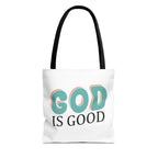 Front view of small White tote bag with black handles and colorful graphic that says God is Good