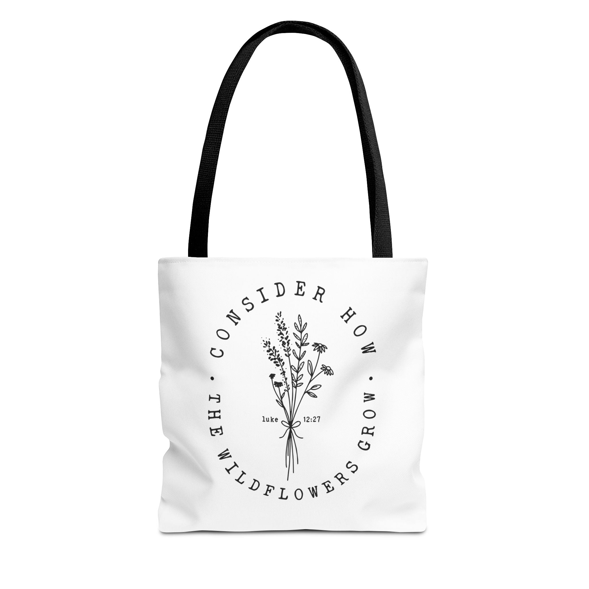 Front view of small White tote bag with black handles and large black floral graphic and Luke 12:27 Bible verse