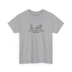 Front view of Sport Grey t-shirt with black text Be Still And Know That I Am God Psalm 46:10 centered on chest
