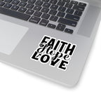 Sticker with black graphic and text saying Faith Hope Love. Displayed on laptop.