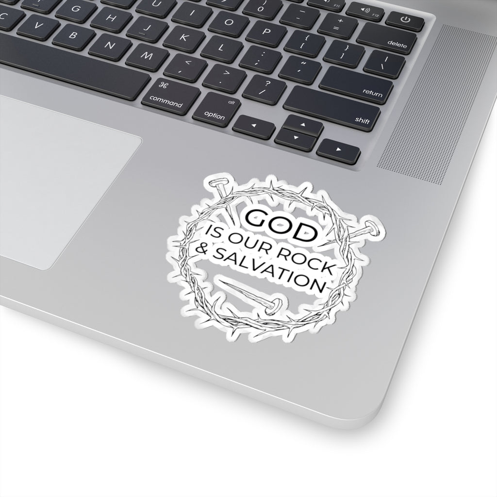 Sticker with black graphic and text saying God Is Our Rock & Salvation. Displayed on laptop.