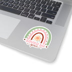 Sticker with pastel colored rainbow graphic with the text Saved by Grace. Displayed on laptop.