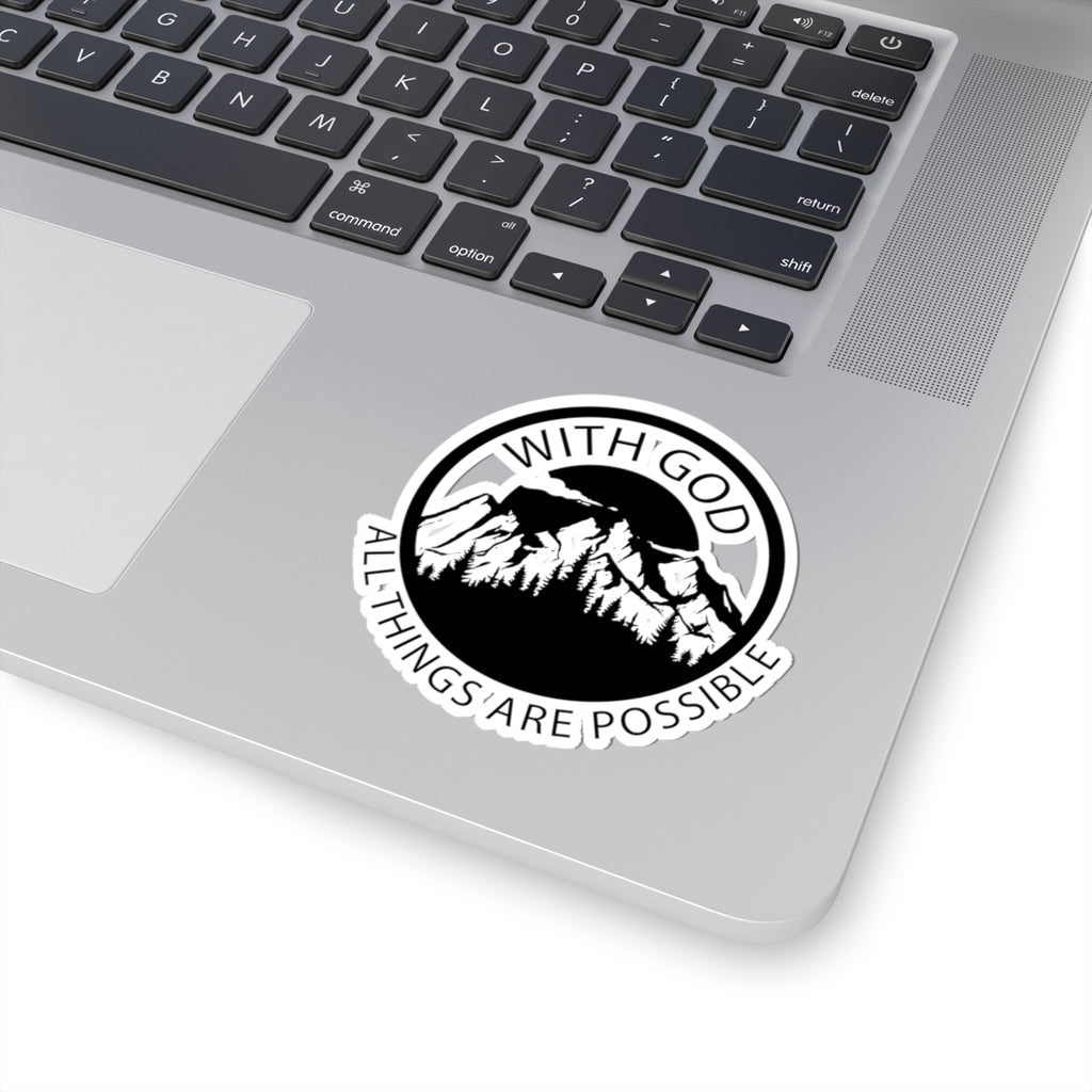 Sticker with black graphic and text saying With God All Things Are Possible. Displayed on laptop.