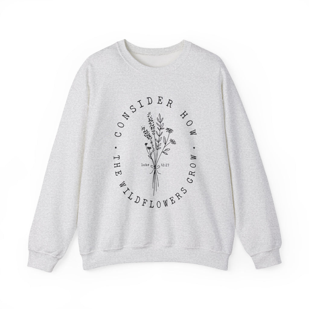 Front view Ash crewneck sweatshirt black floral graphic and 'Consider How the Wildflowers Grow' text from Bible verse Luke 12:27
